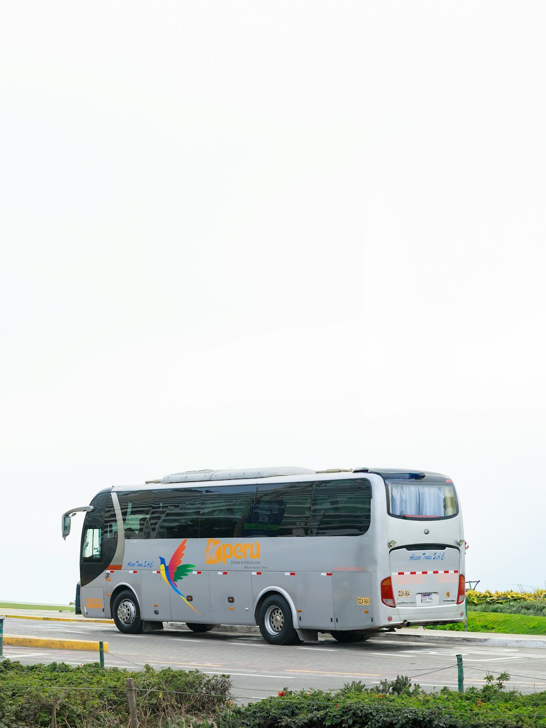 The Art of Drawing Readers In: Your attractive post title goes here a-gray-tour-bus-parked-on-a-road-842wuda7uzk